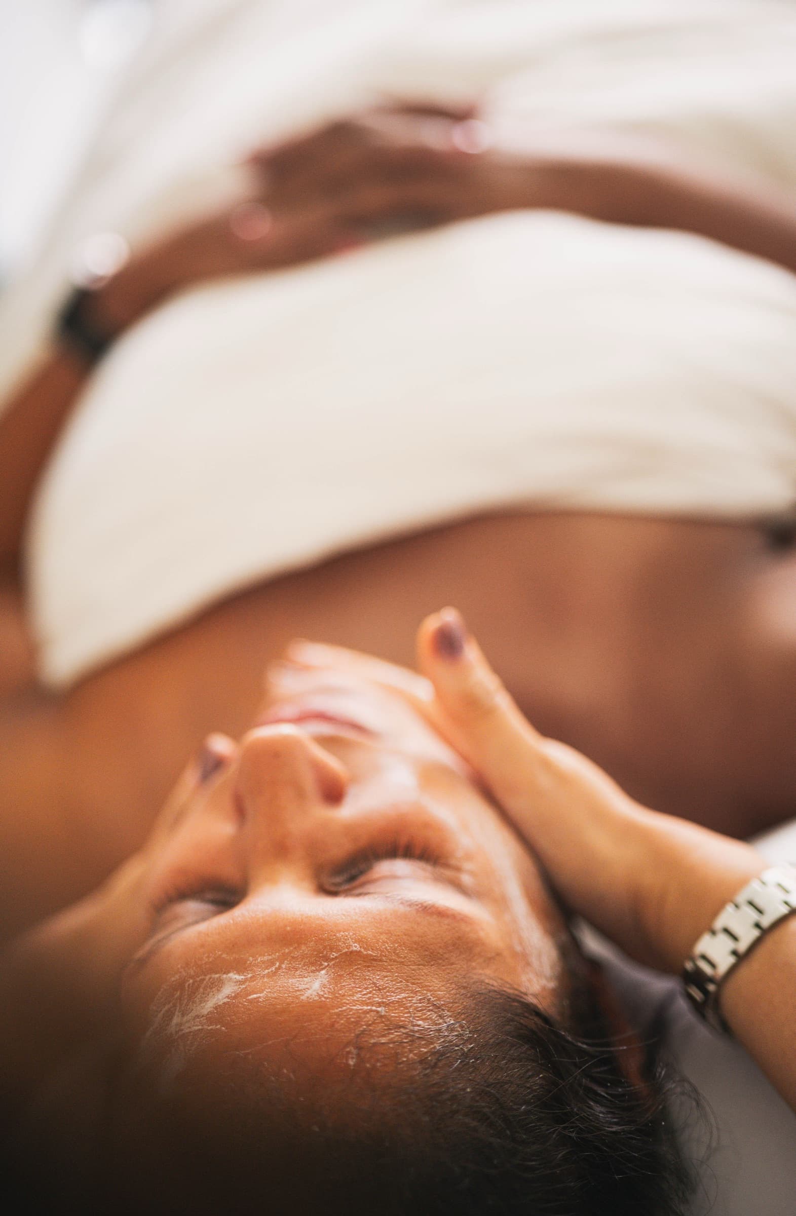 A client resting deeply during a treatment at Relax Revive Beauty